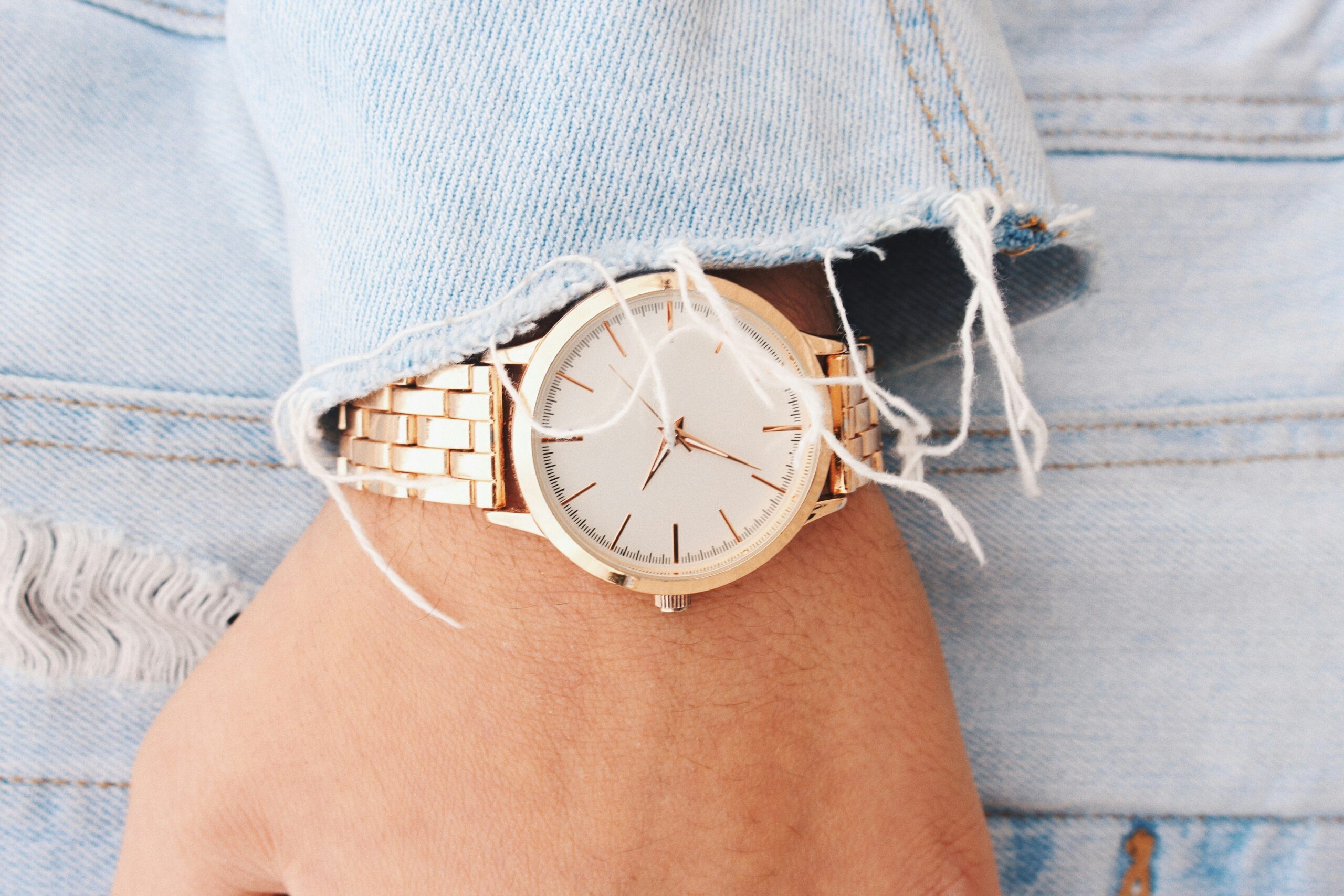 A wristwatch paired elegantly with accessories