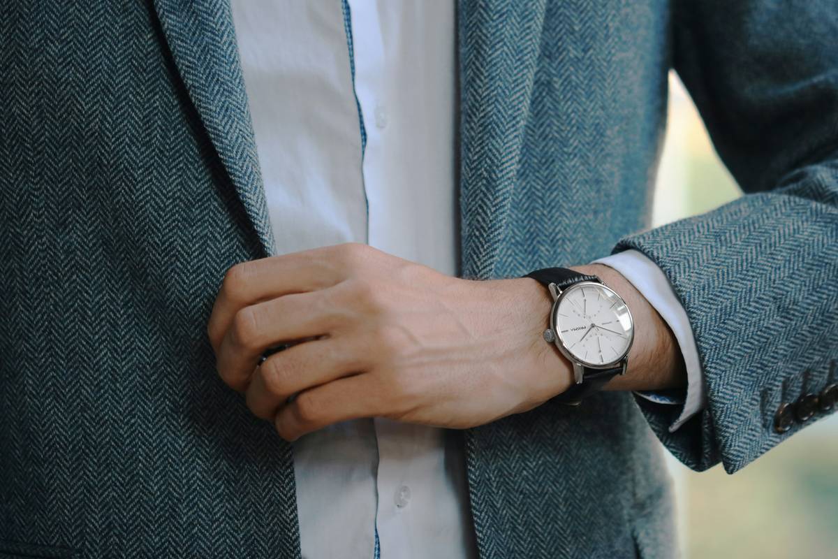 Comparison table showcasing stylish combinations of watches and outfits