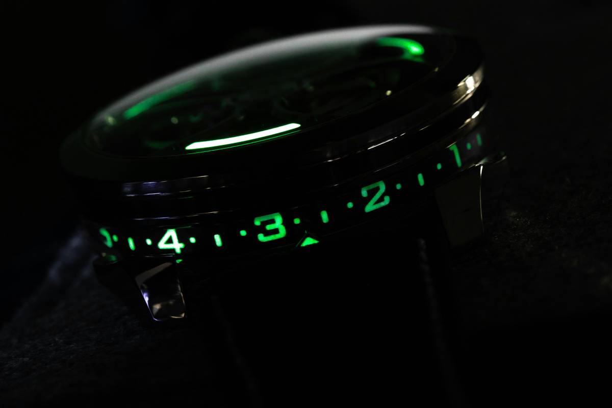 A holographic watch shimmering in sunlight